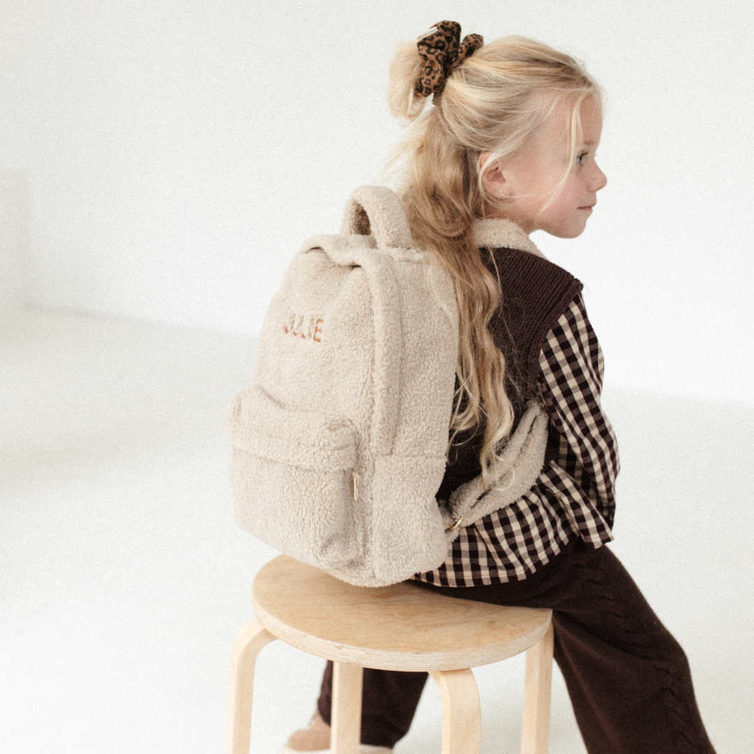 Een teddy rugzak met naam