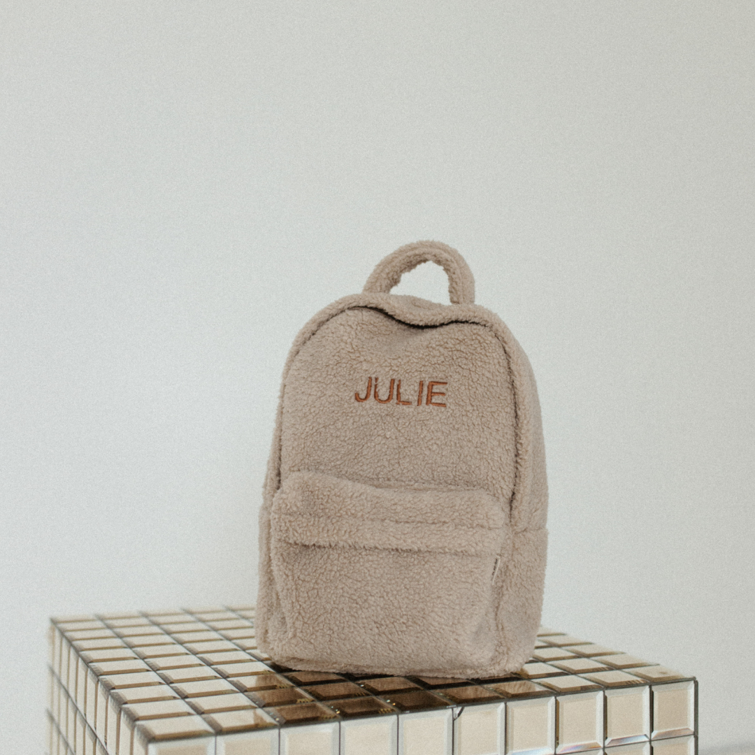 Een gepersonaliseerde rugzak van teddy