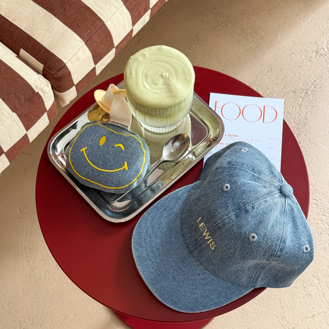 Een gepersonaliseerd speendoekje van spijkerstof