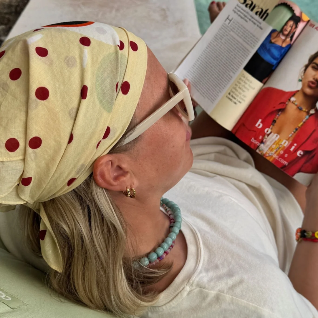 Bandana scarf met een gezichtje erop