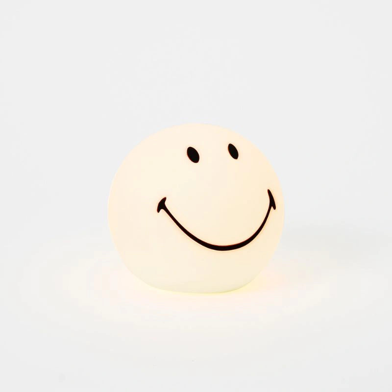 Een witte smiley lamp