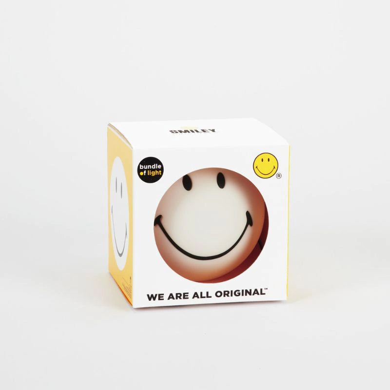 Een witte smiley lamp