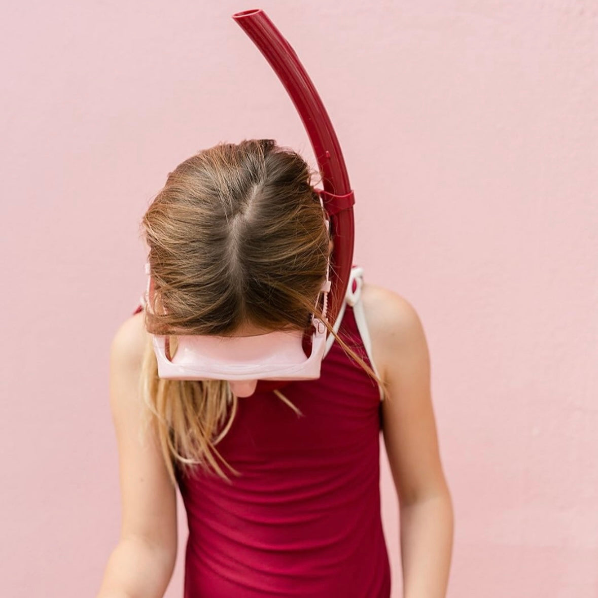 Een snorkelset in het roze met rood
