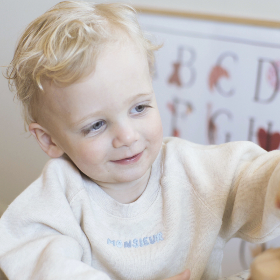 Een trui met personalisatie erop