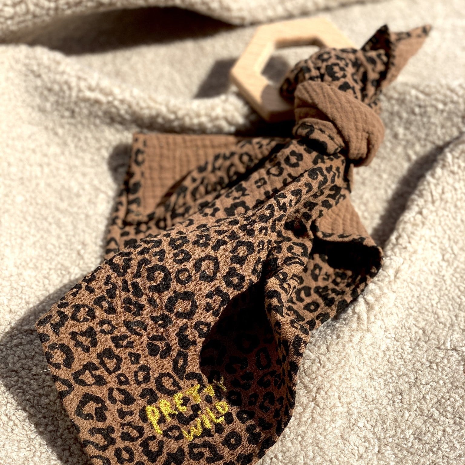 Bijtring met leopard speendoek