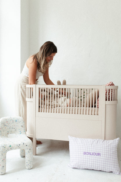 Een gepersonaliseerd, geruit kussen